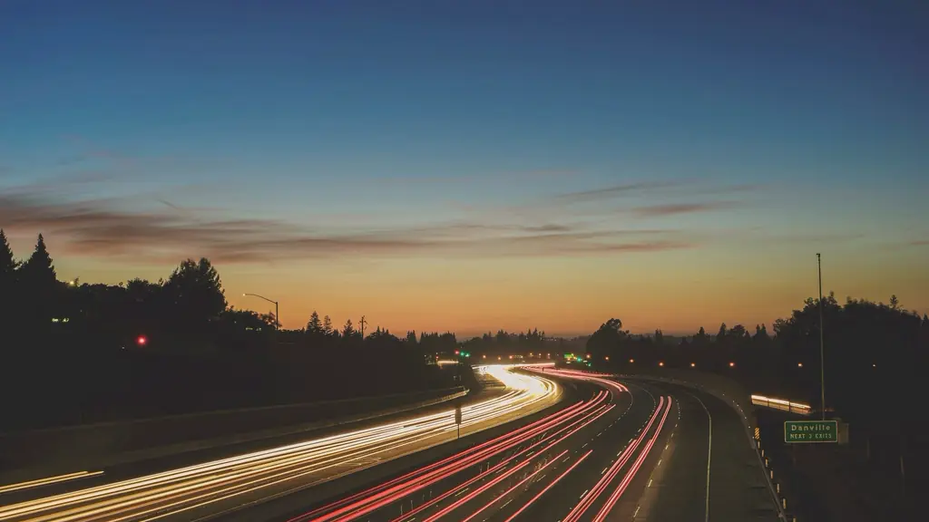 Highway traffic trails at sunset