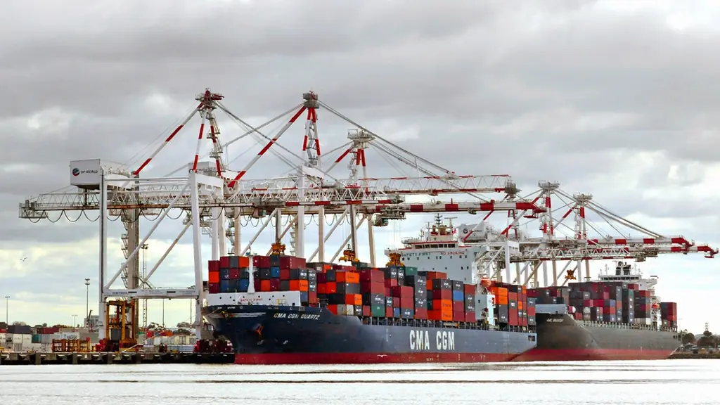 Cranes working a container ship at the quay